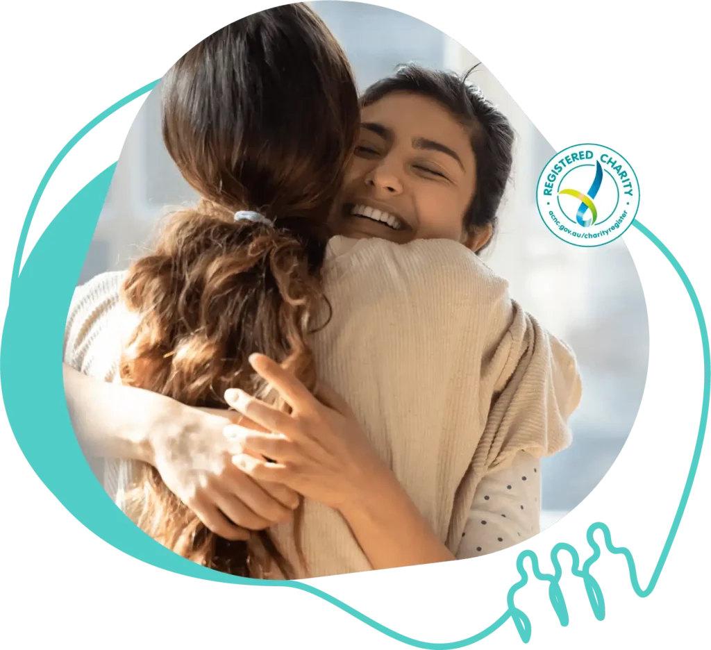 Two people embracing a hug